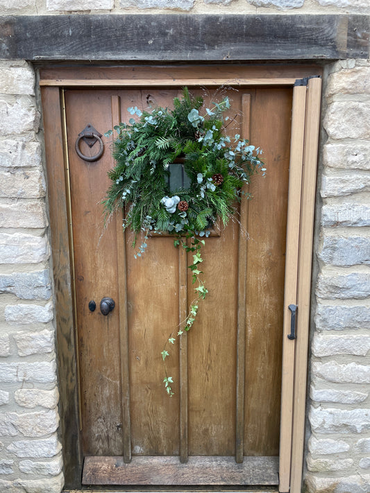 Decorated natural Christmas wreath.